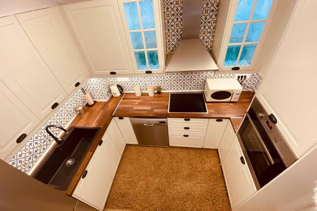 Kuchyň nebo kuchyňský kout v ubytování Casa del Sud