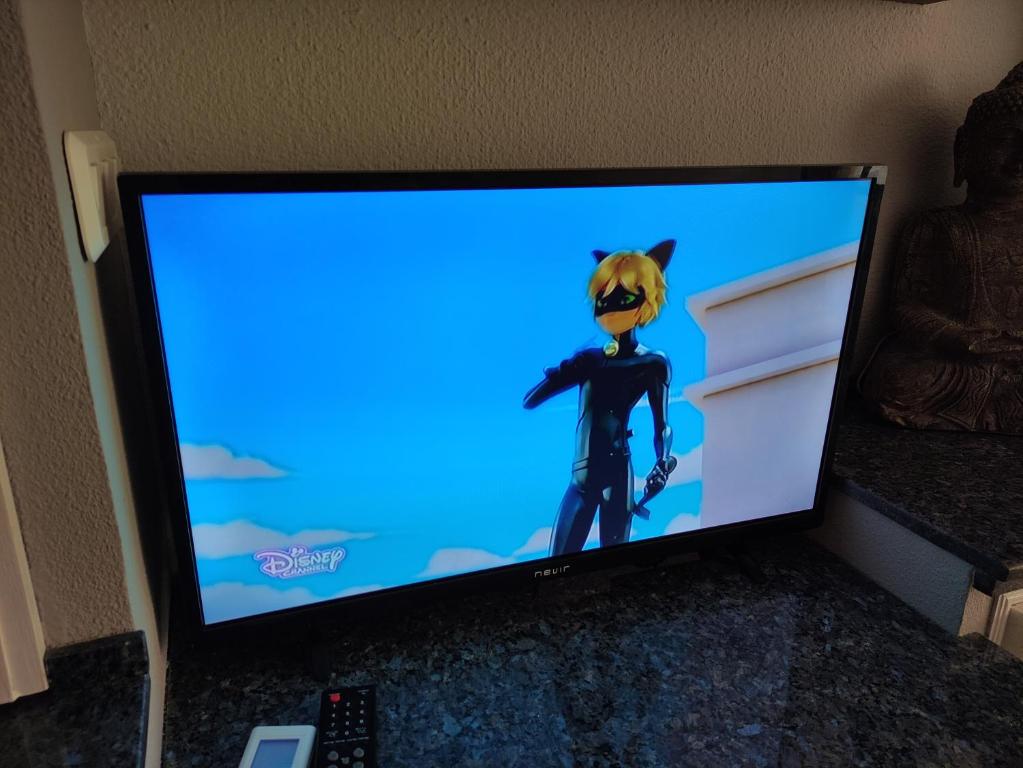 TV a/nebo společenská místnost v ubytování VACACIONES TIERRA Y MAR