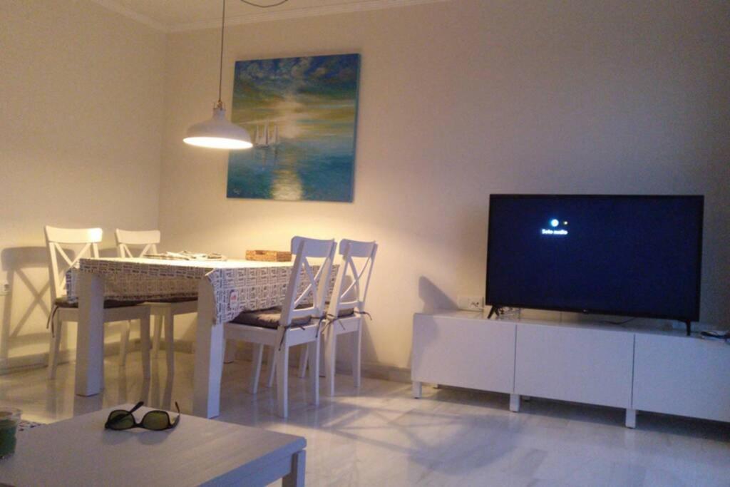 TV a/nebo společenská místnost v ubytování Playa Serena - Mar y Golf