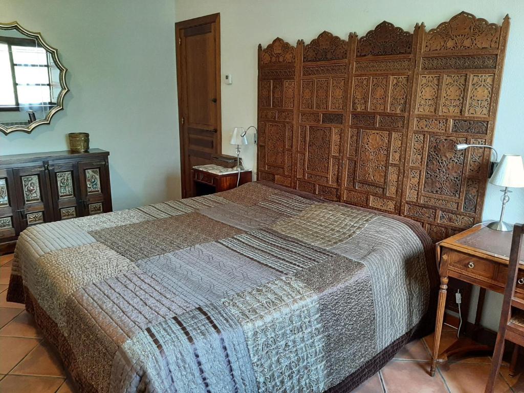 Postel nebo postele na pokoji v ubytování Villa Claudine