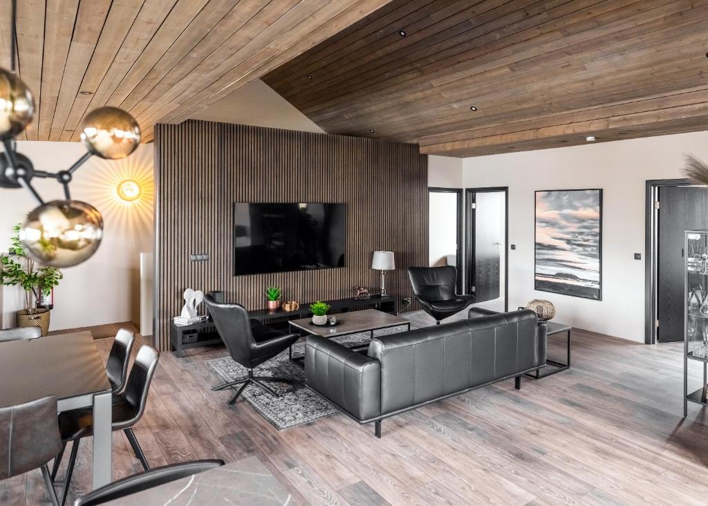TV a/nebo společenská místnost v ubytování Pier Apartments