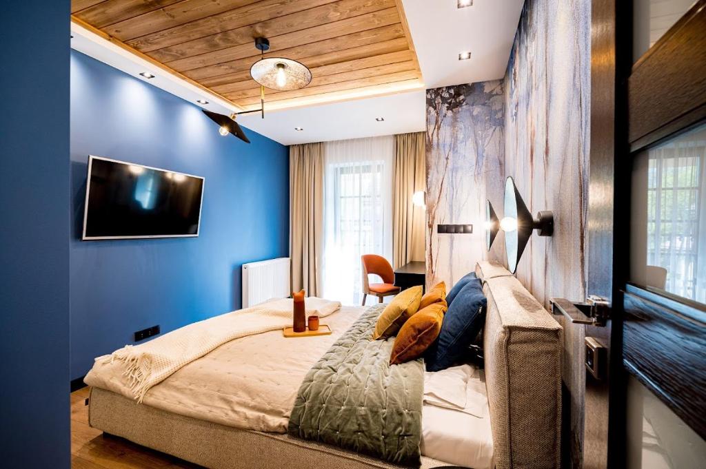 Posteľ alebo postele v izbe v ubytovaní Apartament Wenecja