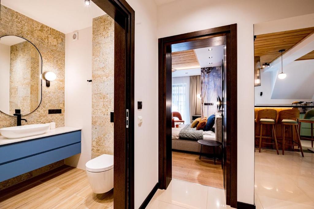 Posteľ alebo postele v izbe v ubytovaní Apartament Wenecja