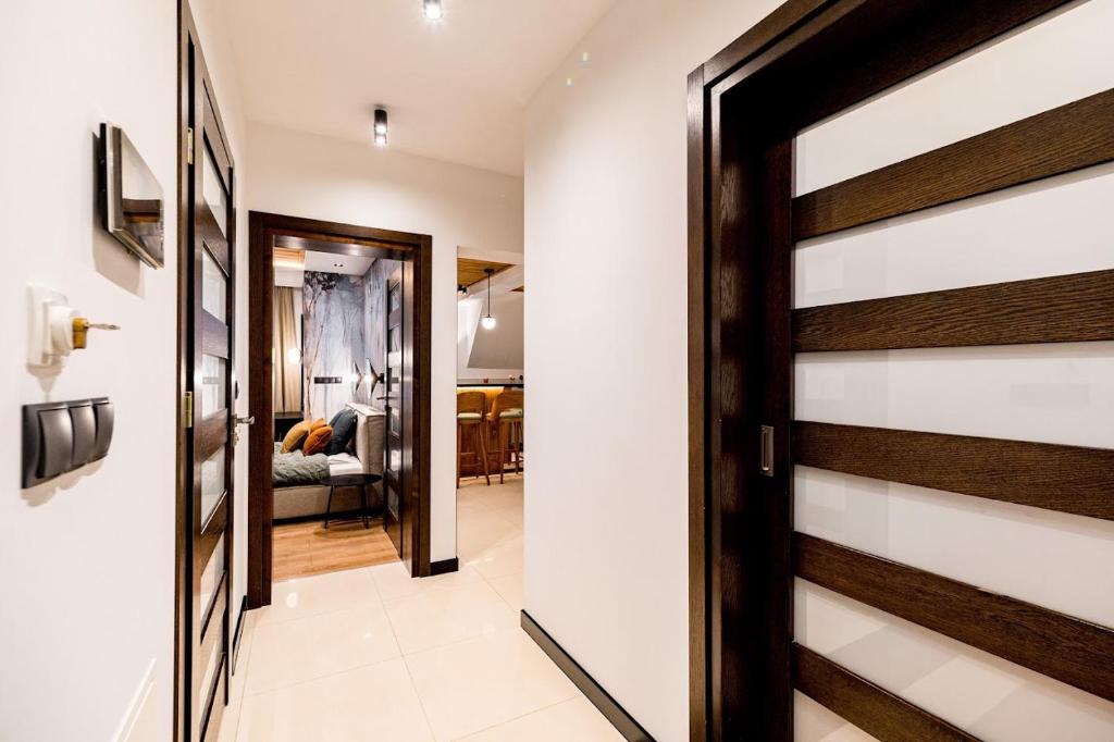 Posteľ alebo postele v izbe v ubytovaní Apartament Wenecja
