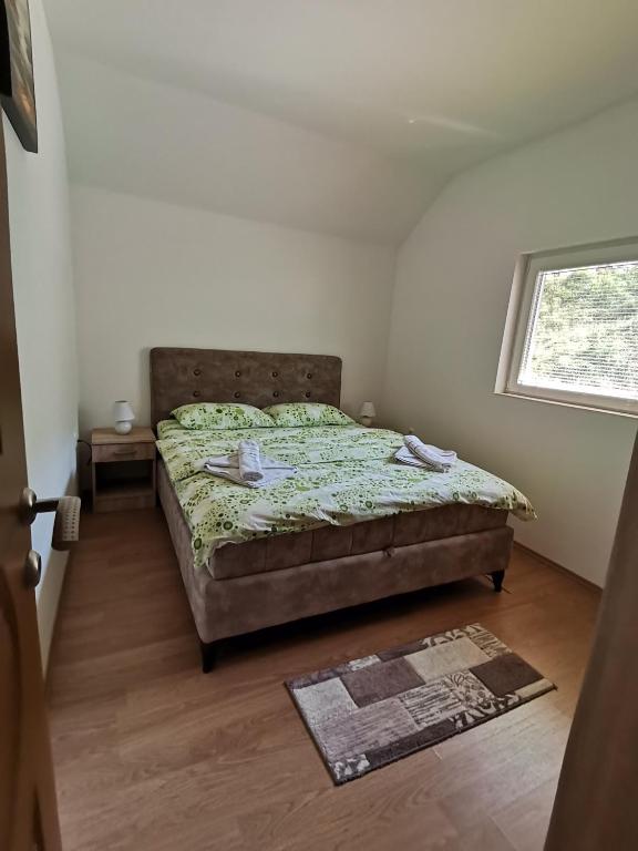 Postel nebo postele na pokoji v ubytování Apartment Osmajic