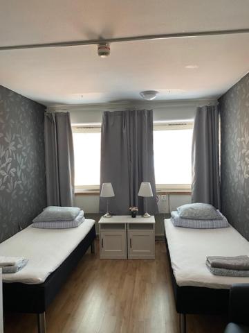 Postel nebo postele na pokoji v ubytování Helsingborgs Vandrarhem, Helsingborg Hostel