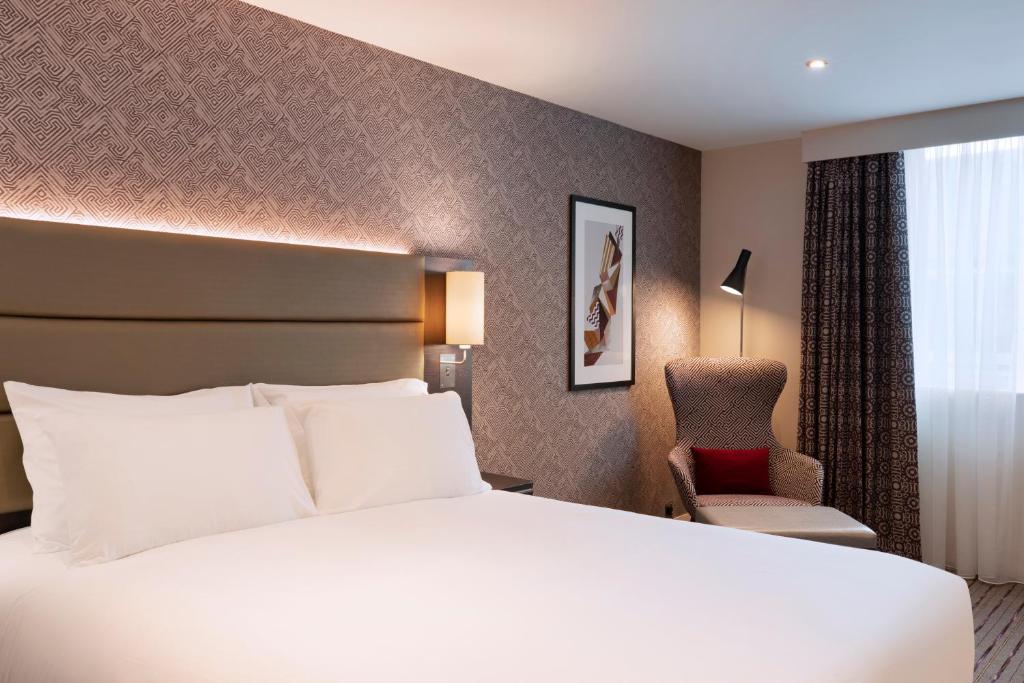 Postel nebo postele na pokoji v ubytování Leonardo Hotel Chester