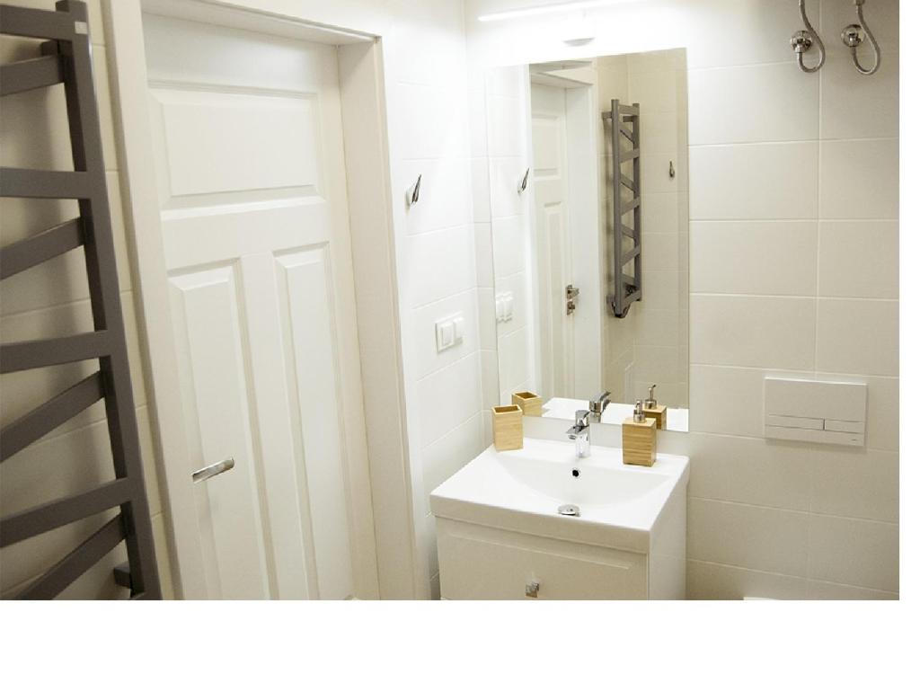 Kúpeľňa v ubytovaní Apartament na Jeziornej