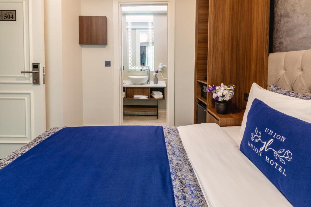 Postel nebo postele na pokoji v ubytování Union Hotel Port