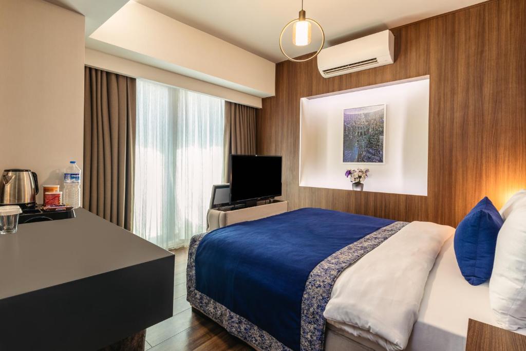 Postel nebo postele na pokoji v ubytování Union Hotel Port