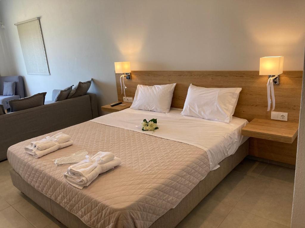 Postel nebo postele na pokoji v ubytování Euphoria Blue studio apartments