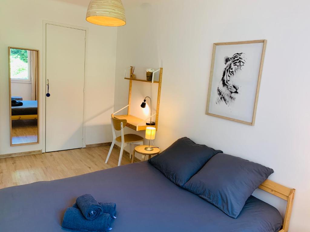 Кровать или кровати в номере Mont D'Or Appartement