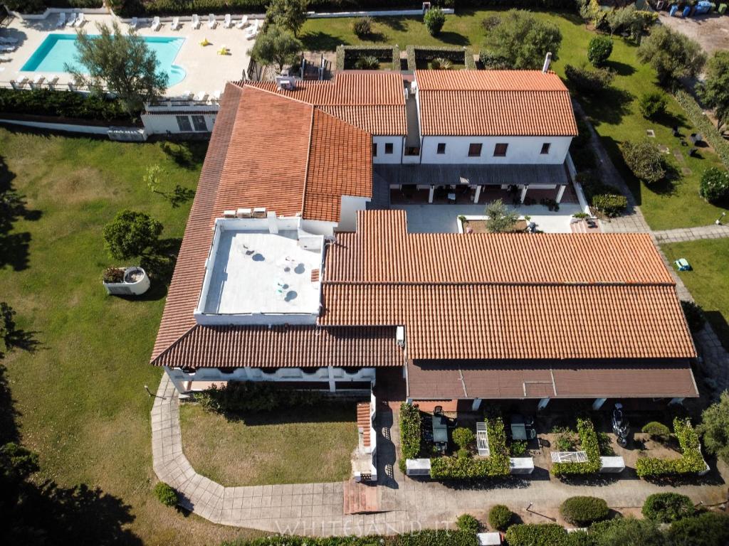 an aerial view of a house with a roof at White Sand Residence in Murta Maria