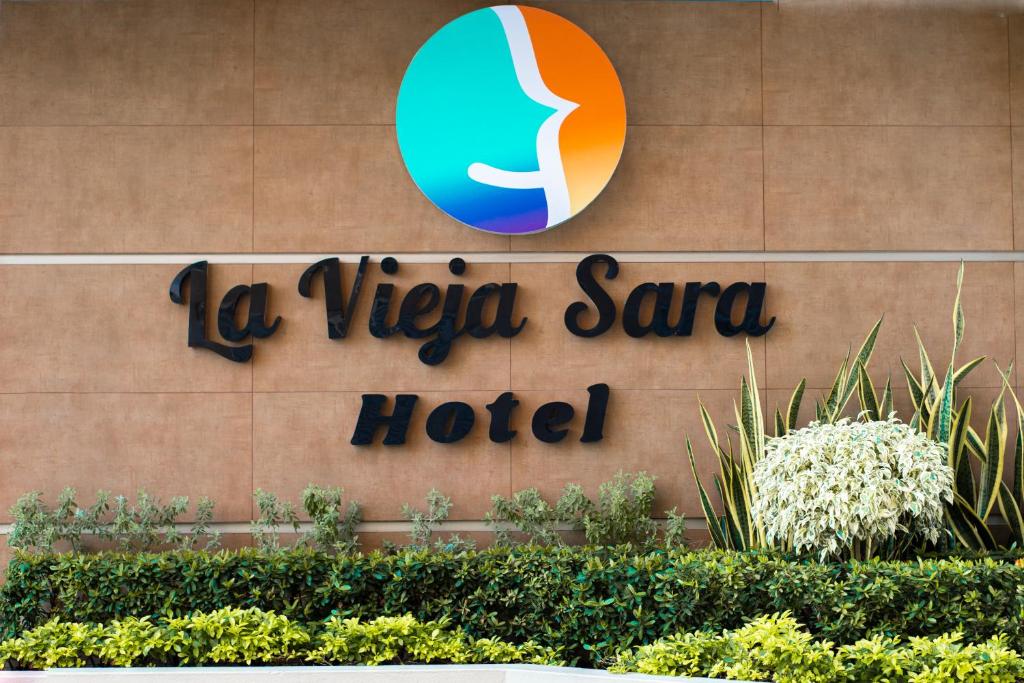 a sign for a vtec santa clara hotel at HOTEL LA VIEJA SARA RIOHACHA in Ríohacha