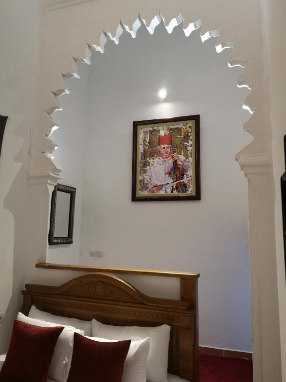 Letto o letti in una camera di Riad & Café culturel BAB EL FAN
