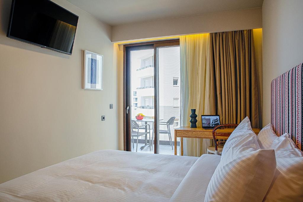 Pavo Art Hotelにあるベッド