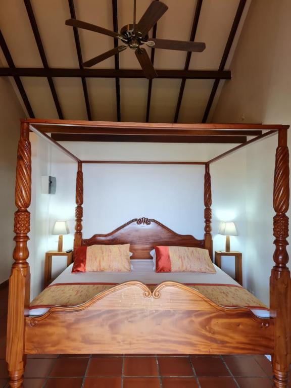 Postel nebo postele na pokoji v ubytování Chambre d'hotes "Villa Rayon Vert"