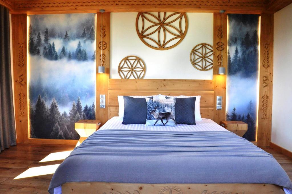 Postel nebo postele na pokoji v ubytování TATRY NA WYPASIE
