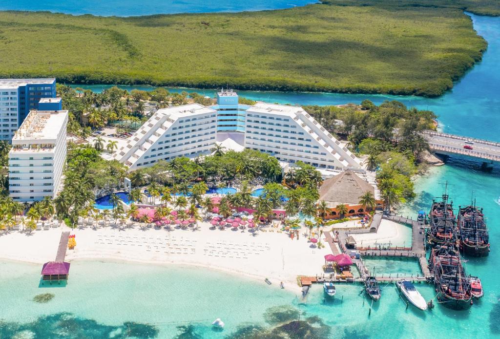 an aerial view of a resort on a beach at Oasis Palm - All Inclusive in Cancún