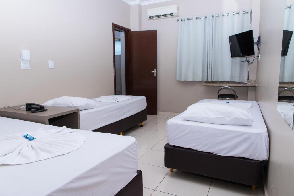 TV a/nebo společenská místnost v ubytování Hotel Astória Maringá