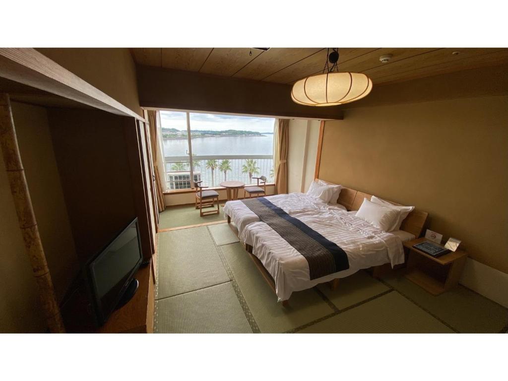 Ένα ή περισσότερα κρεβάτια σε δωμάτιο στο Kanzanji Sago Royal Hotel - Vacation STAY 43400v