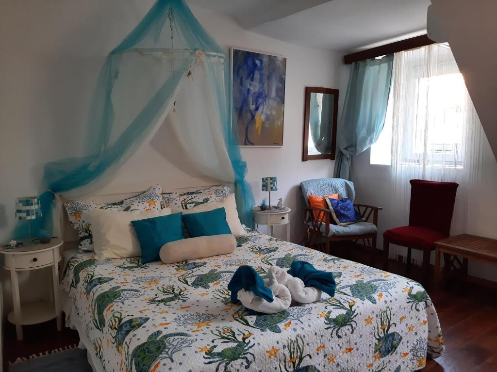 Posteľ alebo postele v izbe v ubytovaní Atelier Tina Art Home