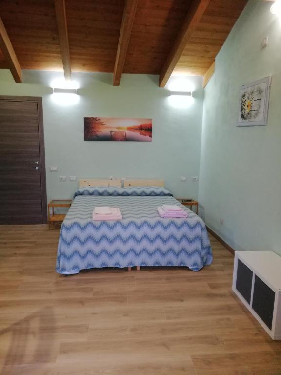 Postel nebo postele na pokoji v ubytování B&B La Plesna