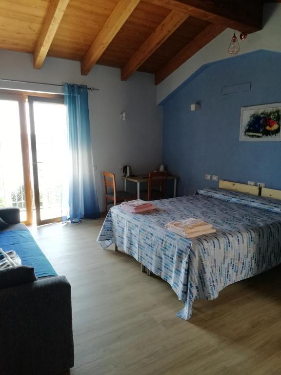 Postel nebo postele na pokoji v ubytování B&B La Plesna