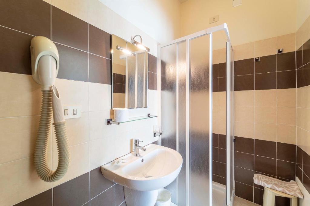 Koupelna v ubytování Hotel San Giuan