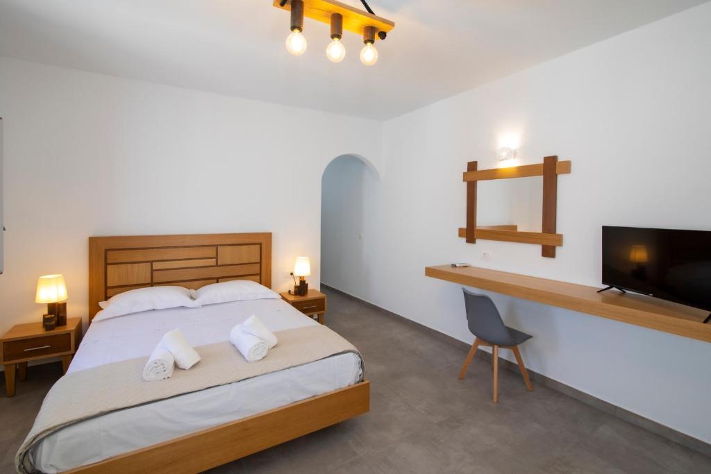 Łóżko lub łóżka w pokoju w obiekcie Petra Aqua Villa