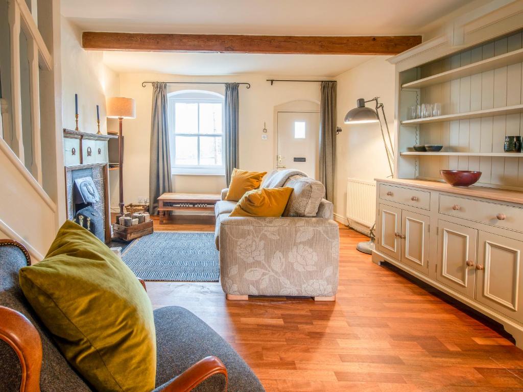 Posezení v ubytování Beacon Cottage