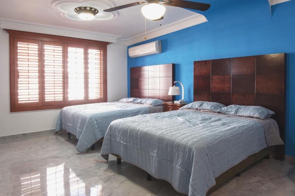 Postel nebo postele na pokoji v ubytování Loft Sabalo - Pet Friendly