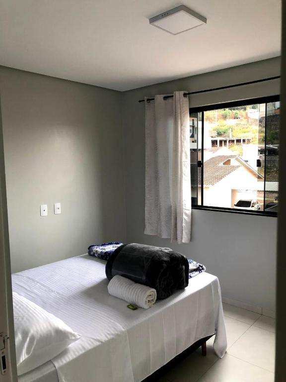 Postel nebo postele na pokoji v ubytování Hotel Bueno's - Francisco Beltrão