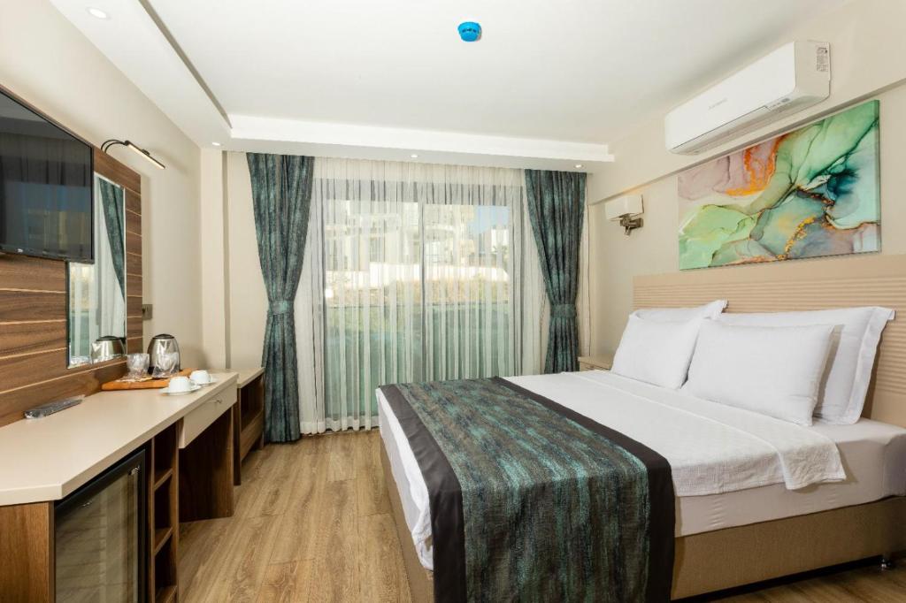 Güllük Yalı Boutique Otel - Deluxe Doppelzimmer (2 Erwachsene + 1 Kind)
