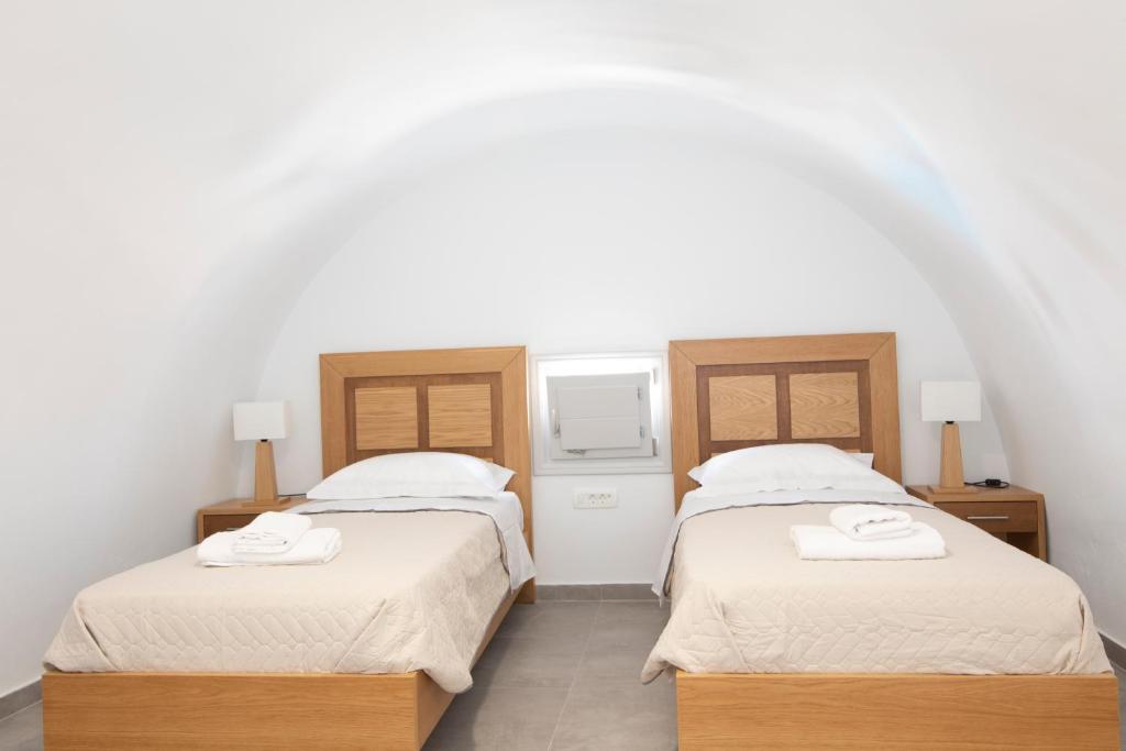 Łóżko lub łóżka w pokoju w obiekcie Petra Aqua Villa