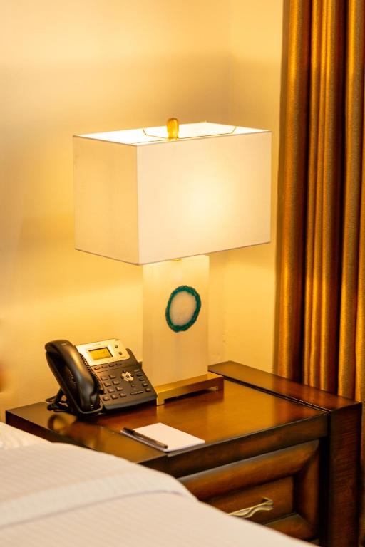 Postel nebo postele na pokoji v ubytování Esiankiki Resort & Spa - Nanyuki
