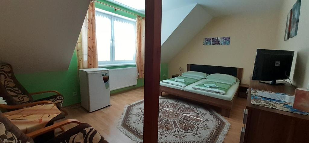Postel nebo postele na pokoji v ubytování U Rozhovoru