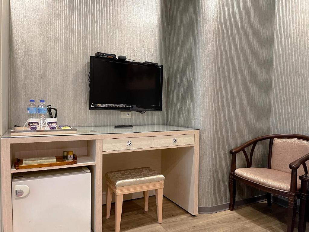TV a/nebo společenská místnost v ubytování Beidoo Hotel