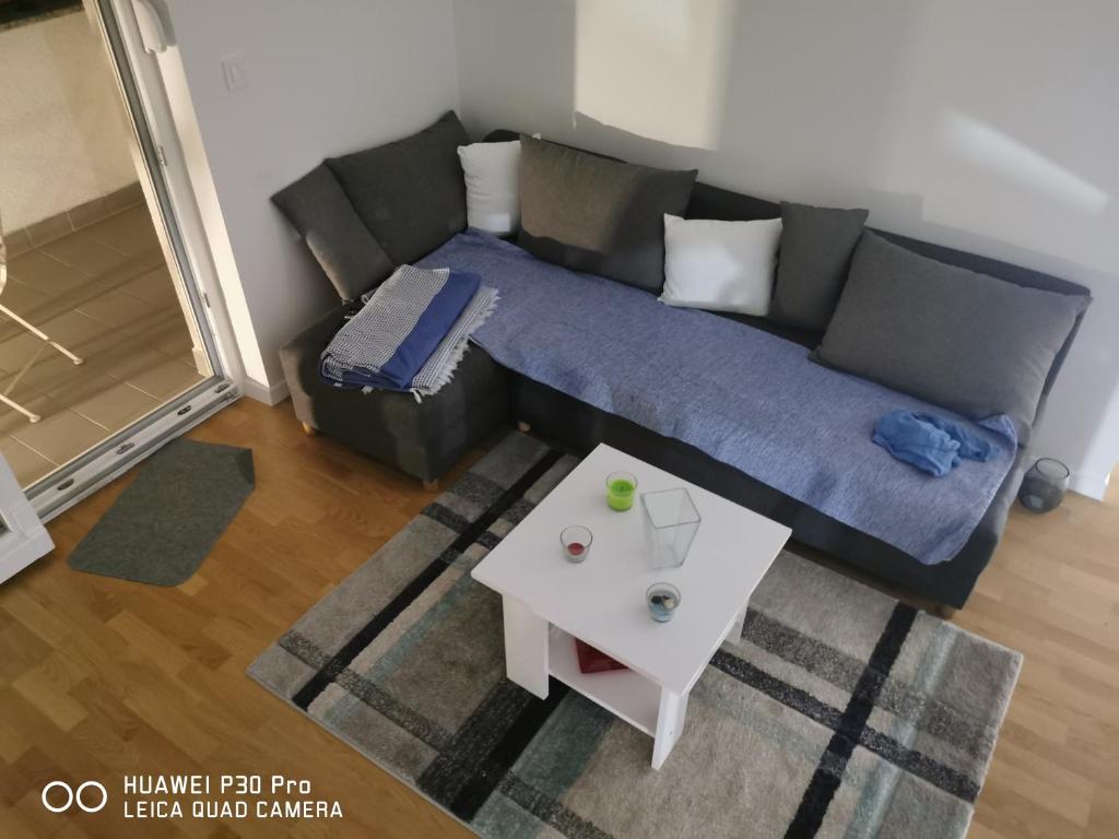 Posezení v ubytování CITY CENTER PEARL #new#free reserved parking in garage elevator direct access#business and pleasure#city view&balcony&sunny&cafes&markets&tram#city center#working room#2 toliets#2 bedrooms