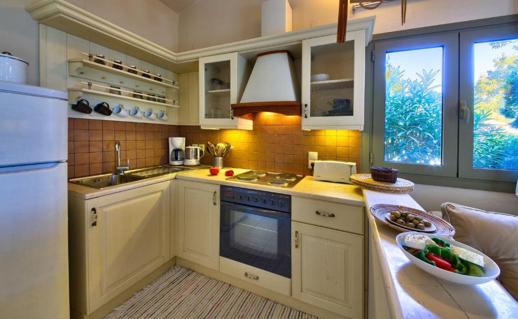Kuchyň nebo kuchyňský kout v ubytování Mill Suites - Loggos