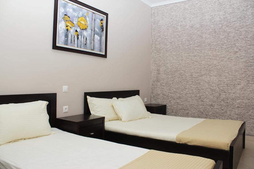 Postel nebo postele na pokoji v ubytování Beva Hotel