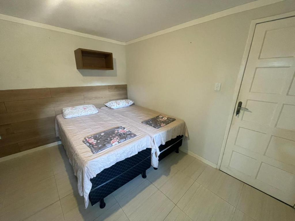 Postel nebo postele na pokoji v ubytování Enjoy Hostel e Pousada
