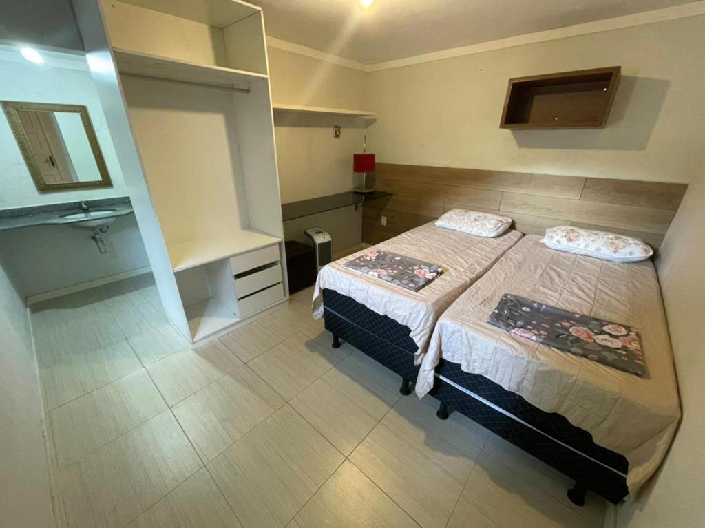 Postel nebo postele na pokoji v ubytování Enjoy Hostel e Pousada