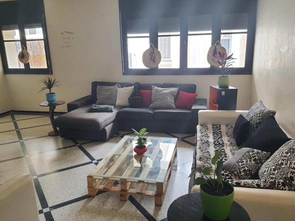 Χώρος καθιστικού στο Chambre mignonne avec petite terrasse