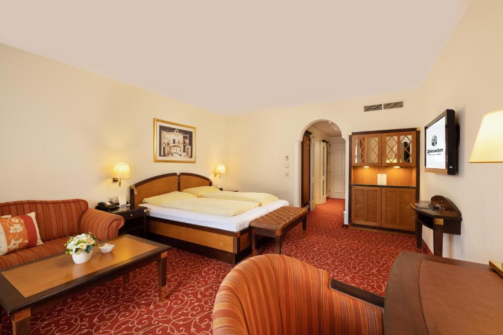 Letto o letti in una camera di Hotel Friesacher