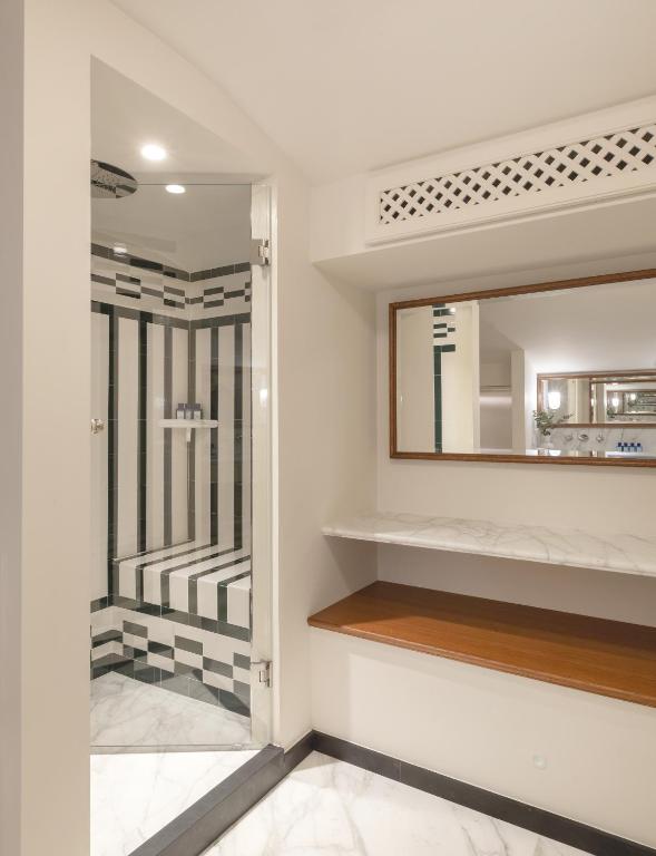 a dressing room with a mirror and a staircase at Splendido Mare, A Belmond Hotel, Portofino in Portofino