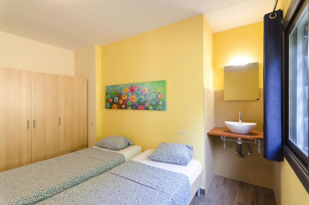 Posteľ alebo postele v izbe v ubytovaní Club Villamar - Arethusa