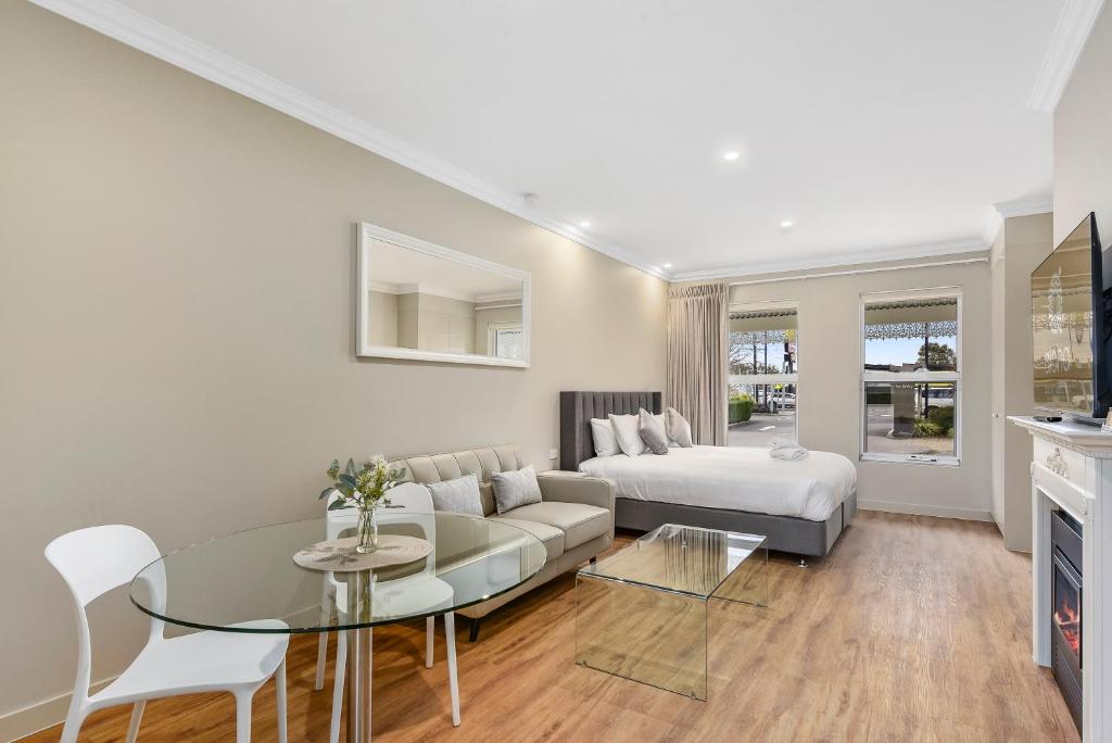 Ένα ή περισσότερα κρεβάτια σε δωμάτιο στο Aloha Central Luxury Accommodation