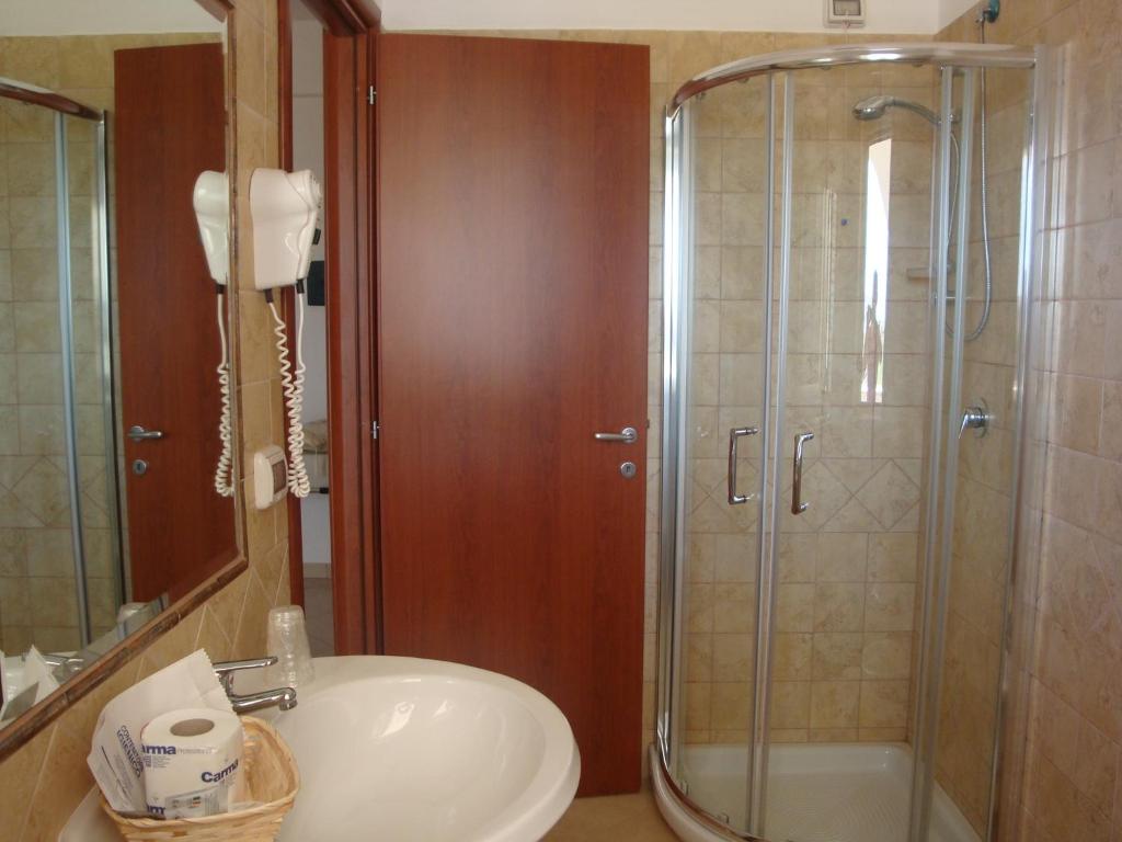 Koupelna v ubytování Hotel Maggiore