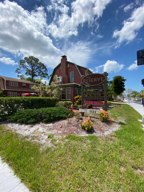 a house with a sign in front of it at The Reserve Retreat in Sarasota